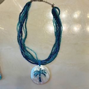 Palm Tree necklace purchased in Aruba.  Wore once